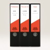 Изображение показывает три черных папки с ярлыками на немецком языке: 'PERSONAL', 'PROJEKTE', и 'TEAM'. Каждая папка имеет свою категорию с указанием подробных подкатегорий. Папки имеют характерный красно-белый дизайн и брендированы под 'Avery Zweckform'.