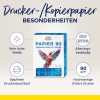 Изображение представляет собой коробку с продуктом 'Drucker-/Kopierpapier', подчеркивая его качества, такие как очень высокая белизна, стойкость к старению и совместимость с струйными и лазерными принтерами.