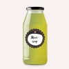 Стеклянная бутылка с зеленой жидкостью с этикеткой 'Minz-sirup'.