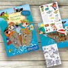 Изображение представляет собой красочную книгу с наклейками на тему пиратов, с иллюстрациями детей в лодке, а также двумя листами наклеек и страницей для раскрашивания. На обложке изображены игривые персонажи пиратов и дизайнерские элементы.